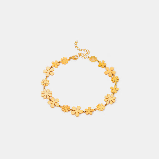 18K gold-plated flower bracelet featuring multiple floral designs and an adjustable extension chain.